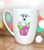 White mug with a dog illustration in a purple pot on a blurred background, featuring 'SASS Artworks' branding.