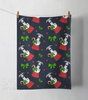 Festive towel with Christmas-themed pattern of whippets or greyhounds in red sacks, candy canes, and bows on an ink blue background.