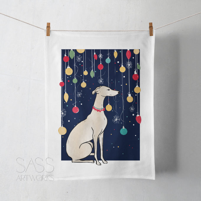 Tea towel with a greyhound or whippet and Christmas ornaments design