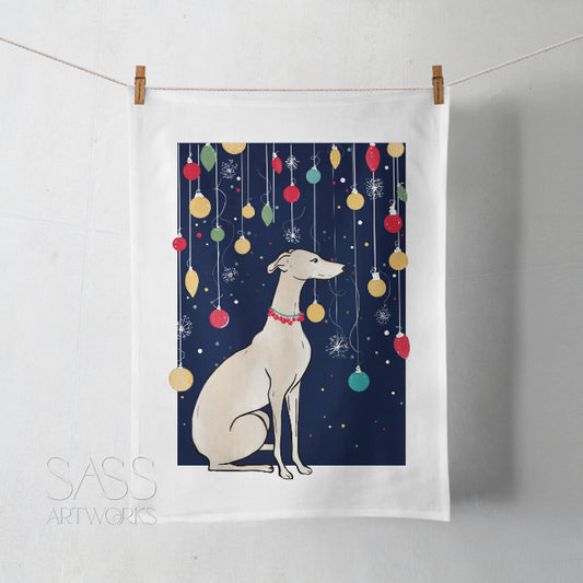 Tea towel with a greyhound or whippet and Christmas ornaments design