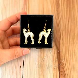 Rita Houndworth white gold earrings in box